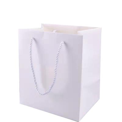 China Recyclable Wholesale Custom Printed Brand Logo Luxury  Shopping Gift Jewelry Paper Bags With Handles for sale