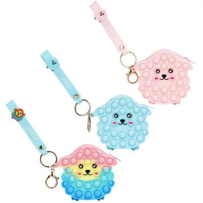 China Fashion factory direct sale children's silicone decompression fashion coin purse key chain for sale