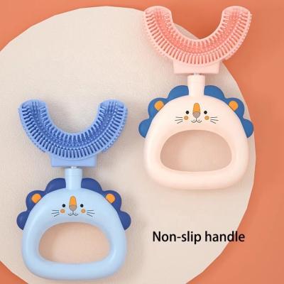 China New small lion food grade home hot selling silicone 360 ​​degree oral hygiene child manual U-shaped toothbrush for sale