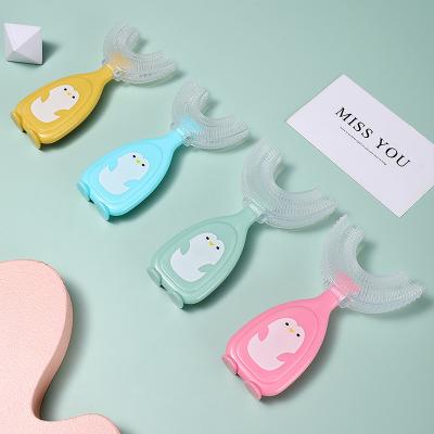 China New home popular creative silicone food grade cartoon 360 degree oral hygiene baby manual U-shaped toothbrush for sale