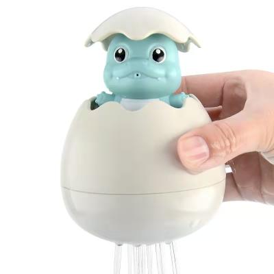 China Bath Toy Plastic Floating Bath Toys Children , Dinosaur Eggs With Water Spray for sale