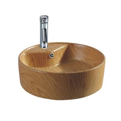 China Modern Hot Sale Texture Art Basin Sink Round Ceramic Wooden Vessel Sink Color Sanitary Ware Faction Designer Art Basin for sale