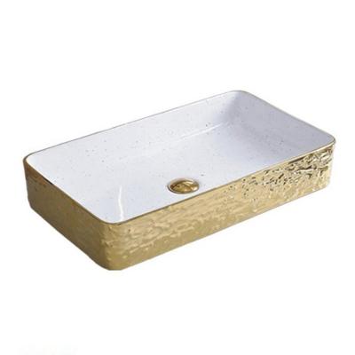 China Modern Luxury Wholesale Gold Sanitary Ware Washing Hand Face Ceramic Gold Art Color Basin for sale