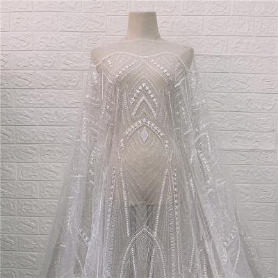 China Fashion Viable White Geometric Fashion French Lace Fabric 51 Inches Embroidery Wedding Dress Bridal Lace Fabric for sale