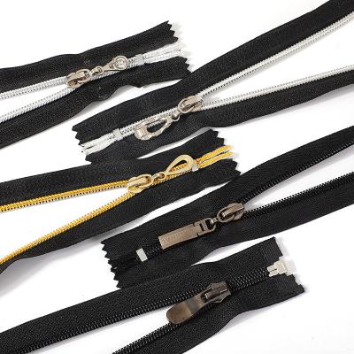 China Hot Selling Auto Lock Self 5# Auto Lock Zipper Pull Lock Single Nylon Zipper Plated Teeth Choked Zipper Ended Zipper for sale