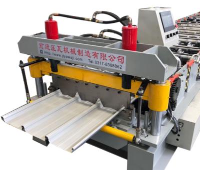 China Building Material Stores Cut Locking Standing Seam Sheeting Roll Forming Machine for sale