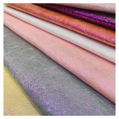 China Waterproof high quality shiny glitter fabric for making shoes, bags, hair bows paster leather for sale