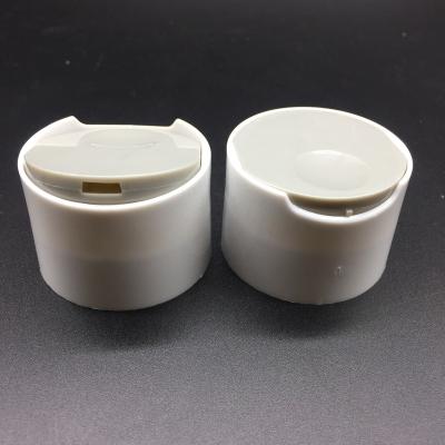 China Non Refillable Matte White Double Disc Wall Surface Top Cap For Lotion Bottle for sale