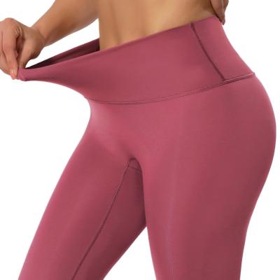 China Lulu Solid Elastic Seamless Breathable Double Swept Capris High Waist Sports Women Yoga Fitness Leggings for sale