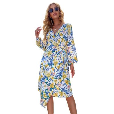 China Anti-Wrinkle Amazon Holiday Leisure V-Neck Bandage Beach Floral Midi Dress For Women for sale