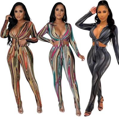 China Fashion women's anti-pilling pattern to print low-cut crop lace up slim split shirt pant leg two-piece set for sale