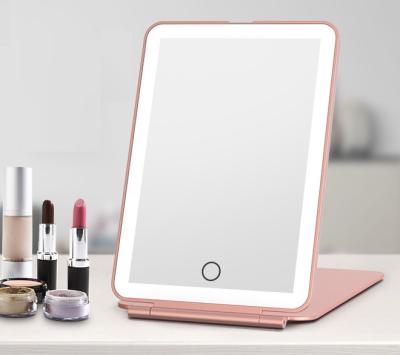 China Hot Selling iPad Lighted Style Cosmetic Plastic Mirror Sight Pocket Makeup Mirror Foldable Dressing Table Mirror With Lights For Travel Use for sale