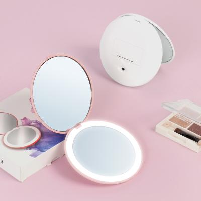 China Double Sided Lighted Pocket Makeup Mirror With Led Logo Custom Compact Small Hand Mirror Light Simple Simple Makeup Mirror Wholesale for sale