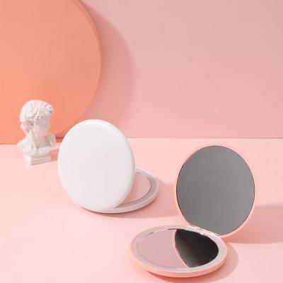 China Pocket Lighted Mini Makeup Mirror Hand Held Vanity Table With Led Cosmetic Compact Hand Mirror Pocket Light Makeup Mirror Custom Logo for sale