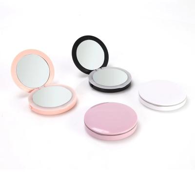 China Foldable Pocket Lighted Rechargeable Compact Hand Mirror With Led Light Portable Power Bank Make Up Vanity Mirror Lights for sale