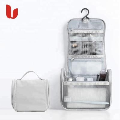 China Custom Hanging Waterproof Travel Wash Bag Toiletry Storage Bag Travel Makeup Cosmetic Bag for Men and Women for sale