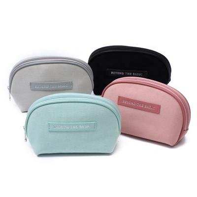 China Fashion factory logo custom shell shape cosmetic bags and cases for sale