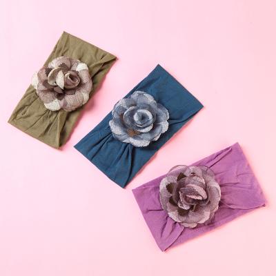 China Solid Color European and American Vintage Fancy Headband Smart Casual Elegant Girls Flower Elastic Hair Band for sale