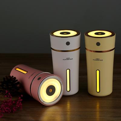 China Best Winter Car Romantic Home LED Night Light Color Changing Mini Portable USB Car Cup Mist Air Cooler Humidifier For Dry Skin for sale