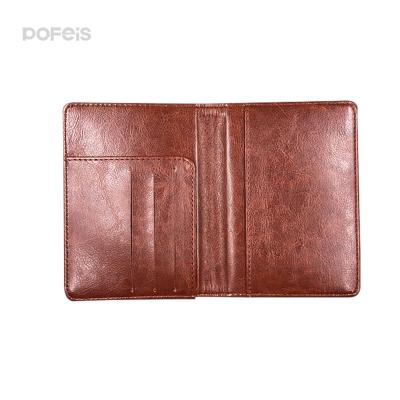 China Fashionable Custom Embossed Logo Passport Cover Travel Wallet Discolor PU Card Storage Passport Holder for sale