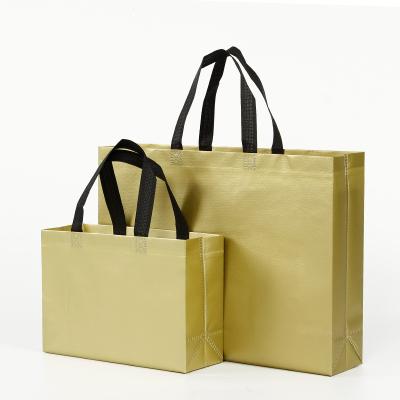 China eco-friendly 3d designed gold laminated non woven shopping bag wears tote bag for clothes with customized logo for sale