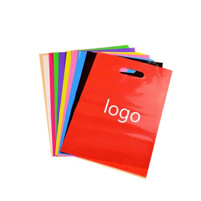 China Non-Toxic Cheap Custom Garment Garment Logo Package Die Cut Clothes To Handle Shopping Bag Plastic Bags for sale