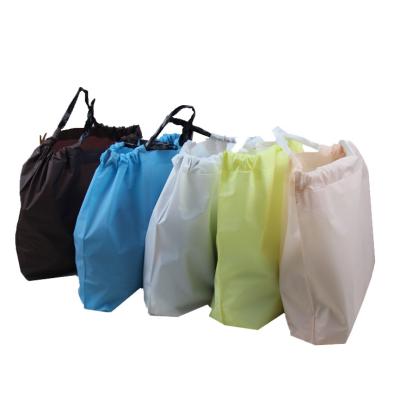 China Eco-friendly Recyclable Custom Logo Clothes Bag Shopping Carrying Frosted PE Packaging Bag Plastic Drawstring Bag for sale