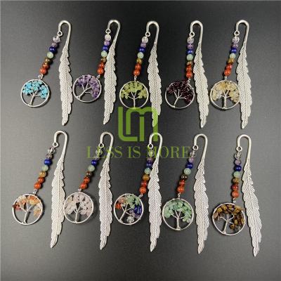 China Wholesale Seven Chakra Healing Meditation Crystal Tree Of Life Feather Metal Waterproof Natural Reiki Landmark Retro For Gift for sale