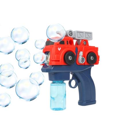 China Plastic Disassemble To Friction Fire Truck Kids Plastic Bubble Maker Gun Diy Assembly Electric Car Water Bubble Machine Outdoor Toys for sale