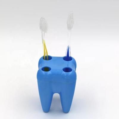 China Durable High Quality Dental Gift Teeth Form 4 Holder Toothbrush Holder Container /Toothbrush Dispenser for sale