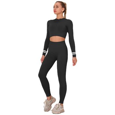 China Breathable Pattern 9296 Stripes 2 Piece Fitness Crop Top And Gym Pants Legging Seamless Long Sleeve Zipper Women Yoga Suit Wear Set for sale