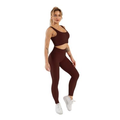 China 9287 New 2021 High Waist Jogger Gaiters Breathable Gym Two Piece Wholesale Bra Top Suit Ribbed Yoga Seamless Set for sale