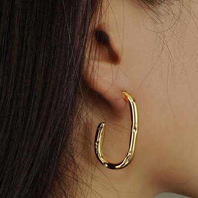 China CLASSIC European Style Gold Plated Oval Circle Earrings Vintage Uneven U Shape Circle Stud Earrings For Women for sale