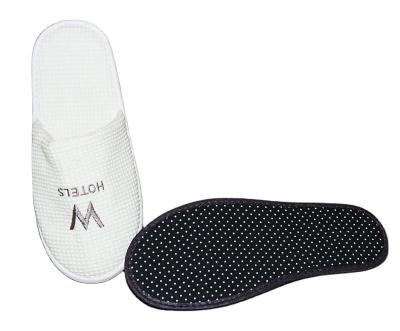 China Disposable Slippers Waffle Hotel Rubber Single Slipper for sale