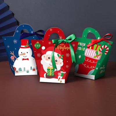 China Recycled Materials Gift Candles Packing Box With Handle Christmas Paper Box Packaging for sale