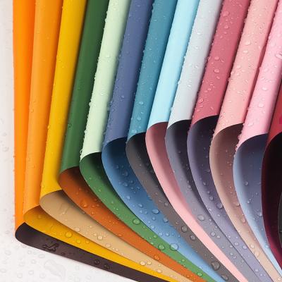 China Hot Sale 58*58cm Waterproof Double Sided Two Tone 28 Colors In Stock Custom Waterproof Kraft Paper For Flower Or Gift for sale