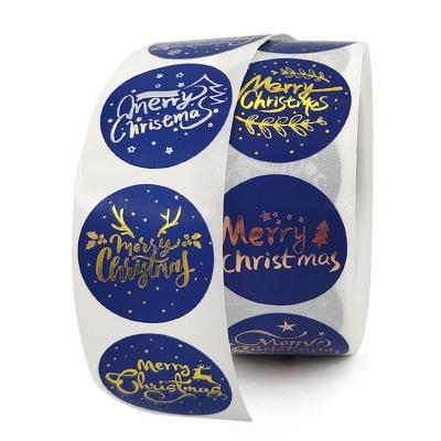 China Custom Printed Round Roll Sticker Label Waterproof Adhesive Paper Sticker For Christmas for sale