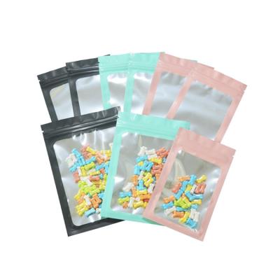 China Custom Logo Pink Matte Zip Lock Mylar Bag Food Grade Smell Proof Moisture Proof Plastic Bags With Clear Window for sale