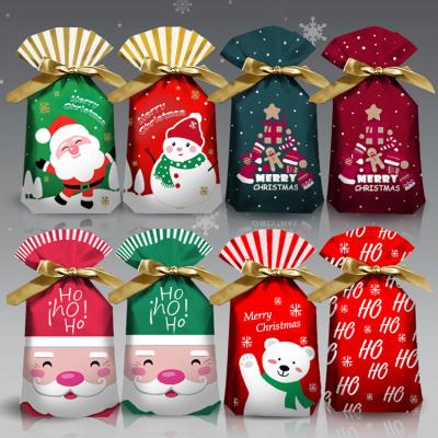 China Recycled Santa Claus Candy /Chocolate Plastic Bag Gift Storage Christmas Packaging Drawstring Bag for sale