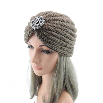 China Fashion Silver Rhinestone Solid Color Winter COMMON Outdoor Knitted Hat For Ladies for sale