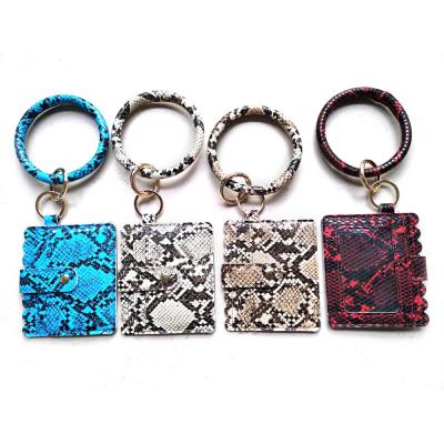 Cina Le ragazze hanno inciso Logo Cute Wristlet Keychain, catena chiave del cinturino dell'orologio del braccialetto di 9.5cm in vendita