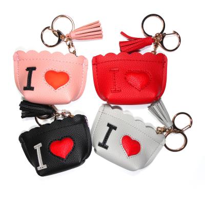 Cina Nappe portatili di incanto del laser Logo Mini Purse Keychain With Trendy di rosa 32g in vendita