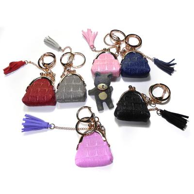 Cina ODM 40g Logo Portable Black Tassel Keychain su ordinazione con la borsa della moneta in vendita