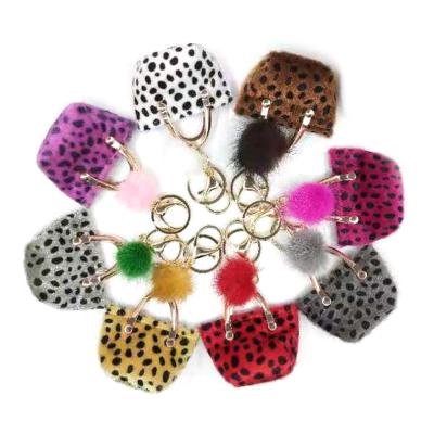 China Ce 7.7x5CM Mini Coin Purse Keyring, Vlek Gedrukt Pom Pom Bag Keychain Te koop