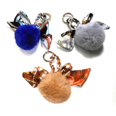 China Lichtgewicht Pluizig Pom Poms Keychain Te koop