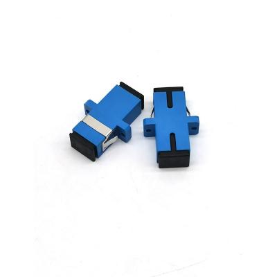 China Blue Green PVC SC/PC SC/APC Ceramic Singlemode Simplex Fiber Optic Adapter FTTH Optical Coupler With Ear for sale