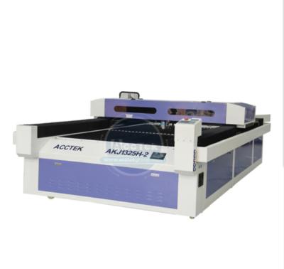 China 660KG WATER COOLING CO2 Laser Cutting Machine High End Engraving Head With Following Up System for sale