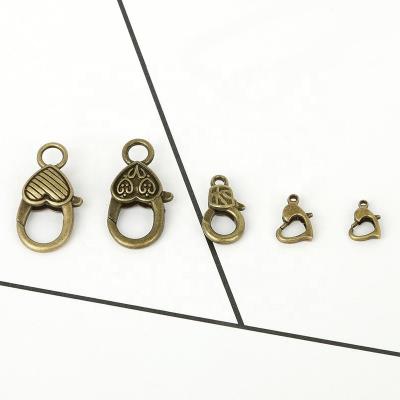 China DIY Opens Stainless Steel Jewelry Accessories Silver Gold Plated Heart Filigree Clasp for sale