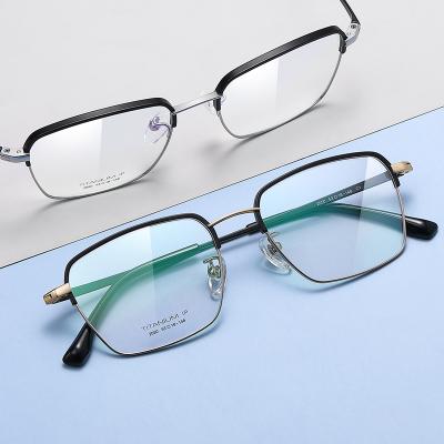 China Pure Titanium Half Rim Eyeglasses Optical Frame Men's Business Slim Ultralight Fashionable Screwless Glasses Optical Frames for sale