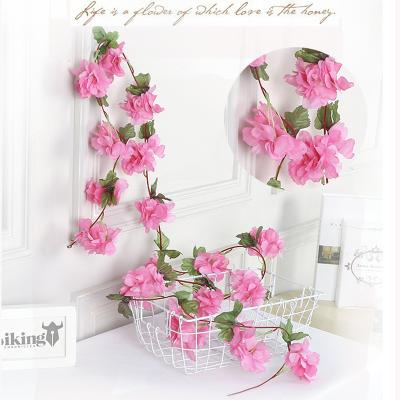 China Wholesale Fashional Artificial Flowers Wedding Decoration Flower Vine Air Conditioner Pipeline Entangled Fake Flower Rattan Home Simulation Cherry Rattan for sale